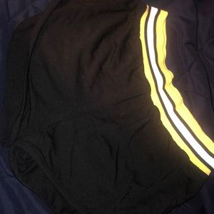 Black shorts, with white&yellow strips